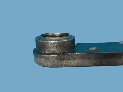 Process change from welding to cold press forming of the burring section – Door hanging bracket