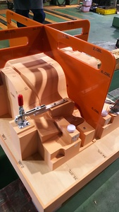 Inspection jig, automotive interior parts, tunnel cover